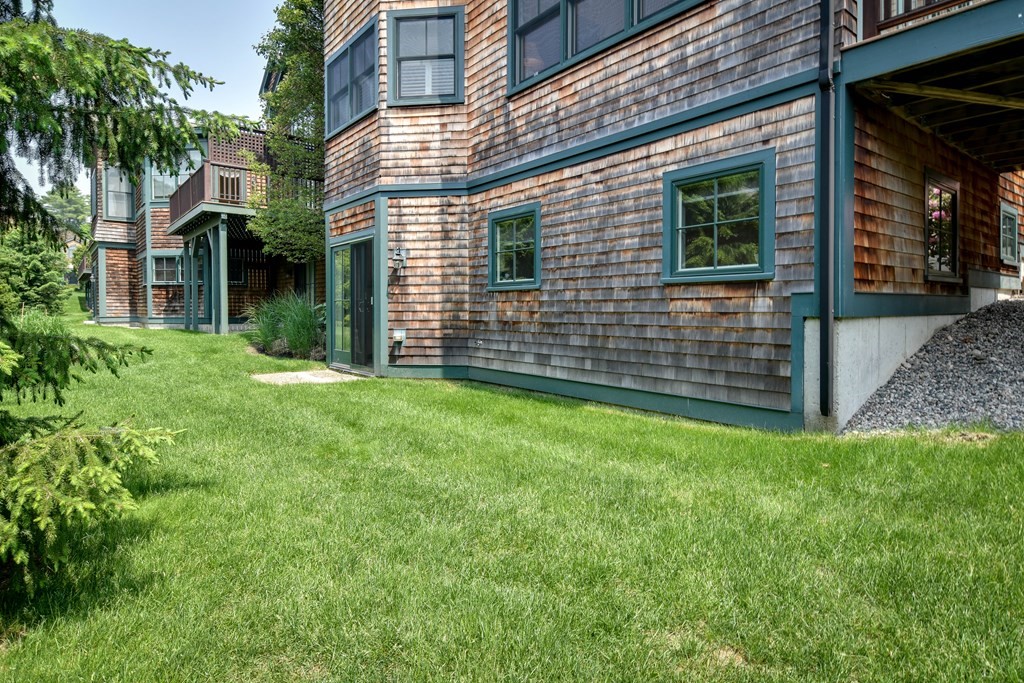 7 Hawthorne Lane, Unit 7 Dover, MA 02030 - Photo 28 of 30 a view of a house with a yard
