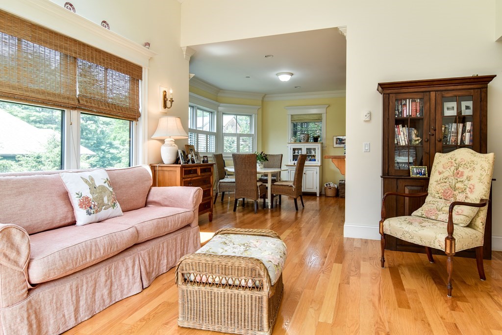 7 Hawthorne Lane, Unit 7 Dover, MA 02030 - Photo 7 of 30 a living room with furniture and a large window