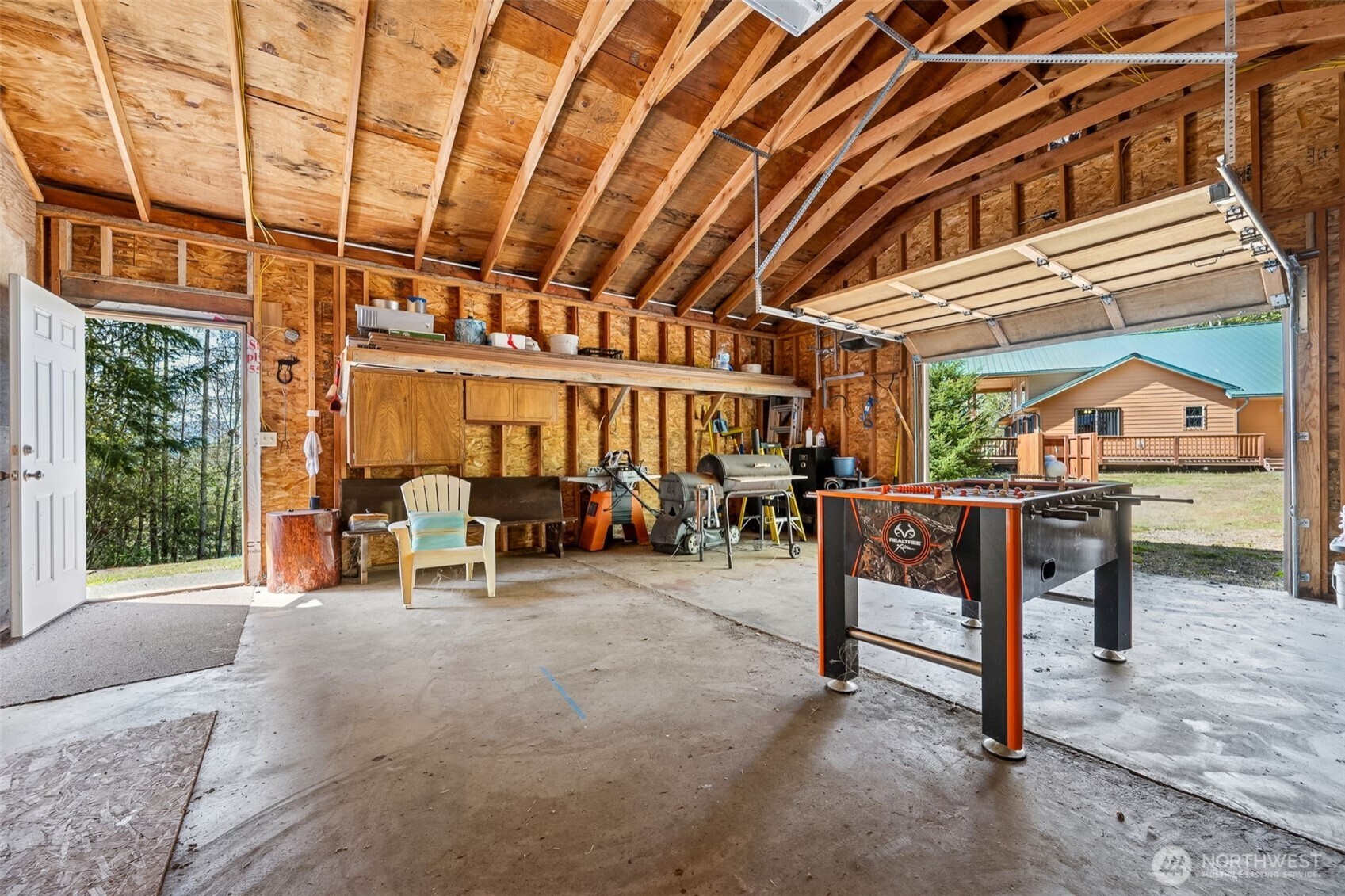 0 Boyd Road Randle, WA 98377 - Photo 28 of 39 a view of a patio with table and chairs and potted plants