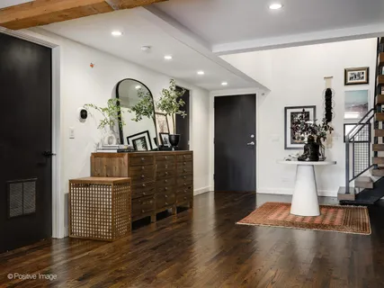 a view of living room with furniture and window