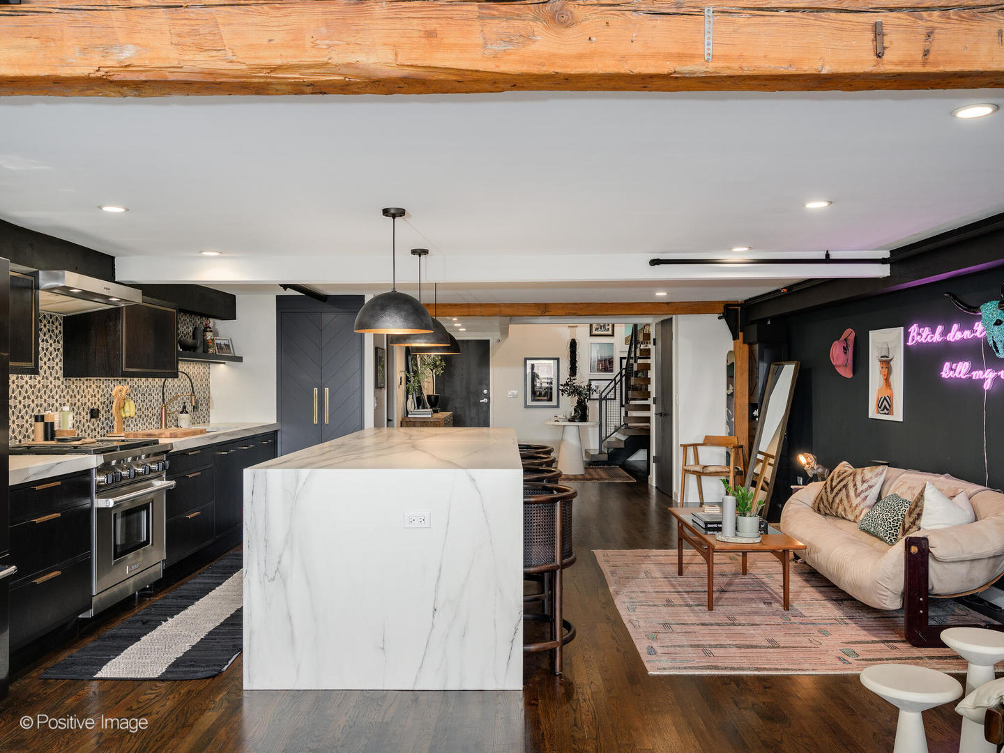 1000 West Washington Boulevard, Unit 542 Chicago, IL 60607 - Photo 6 of 29 a kitchen with stainless steel appliances granite countertop a stove top oven a sink a counter top space and cabinets