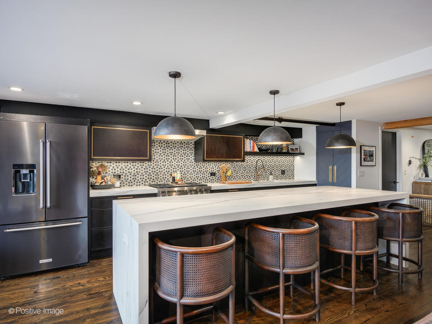 1000 West Washington Boulevard, Unit 542 Chicago, IL 60607 - Photo 7 of 29 a kitchen with stainless steel appliances a sink and a refrigerator