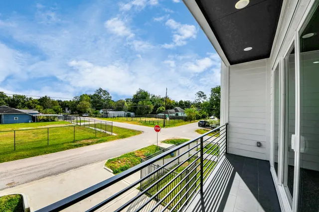 a view of a swimming pool with a lounge chair