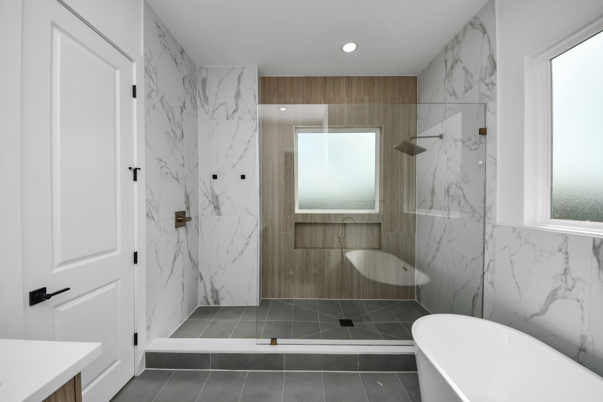 6949 Foster Street Houston, TX 77021 - Photo 27 of 40 a bathroom with a shower and a toilet