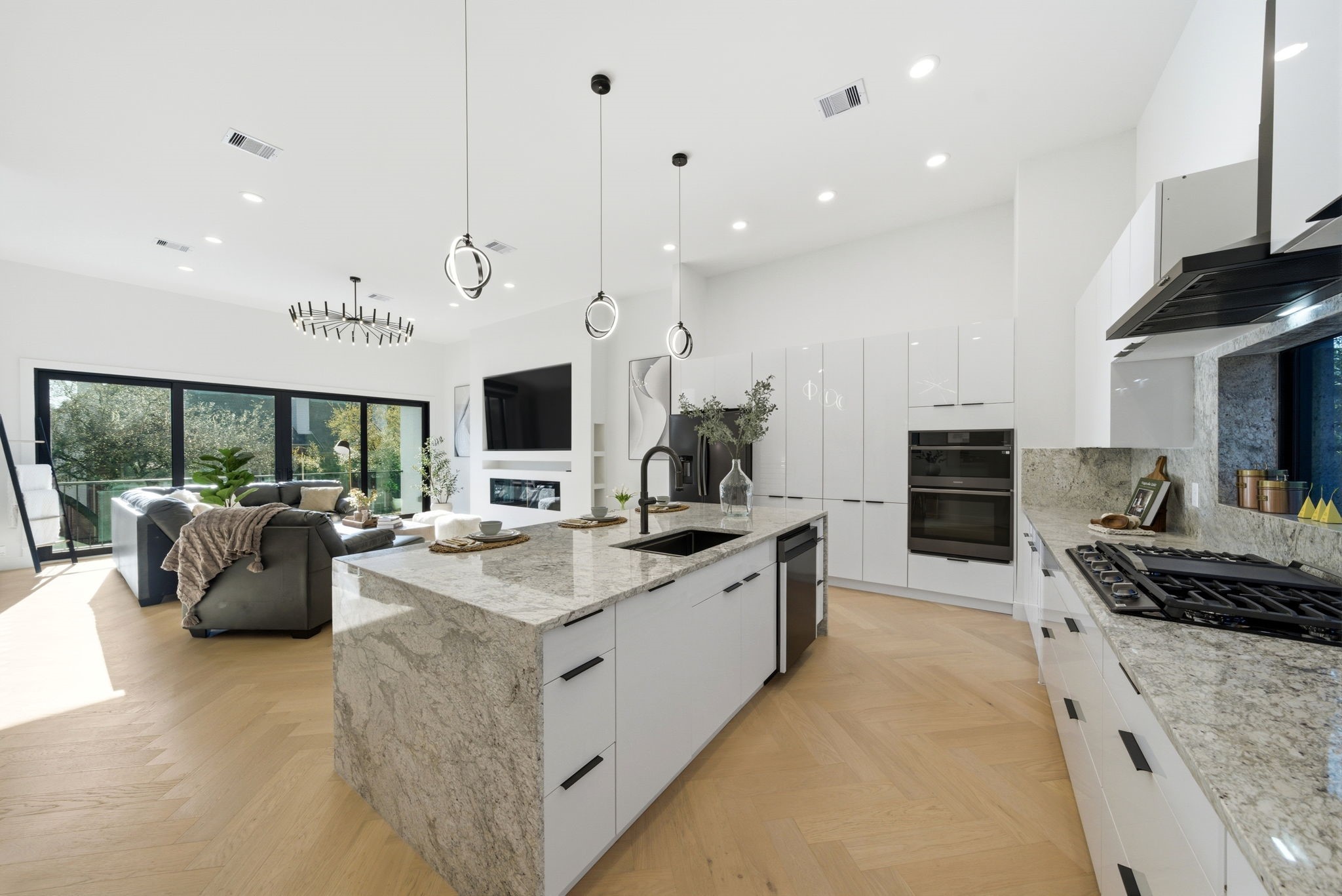 809 Memorial Heights Drive Houston, TX 77007 - Photo 15 of 40 a large white kitchen with a large window and stainless steel appliances