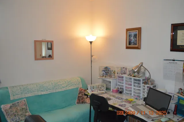 a view of a workspace with furniture