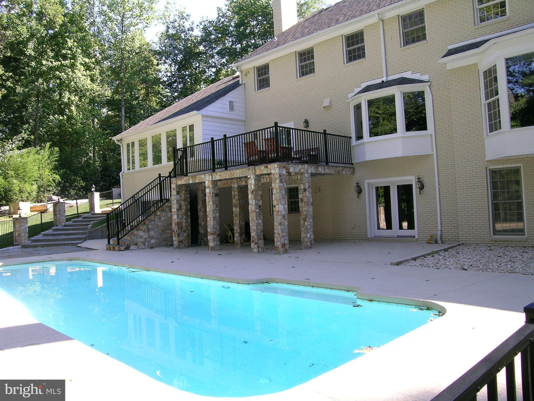 7570 Potomac Fall Road McLean, VA 22102 - Photo 18 of 20 a view of a house with backyard