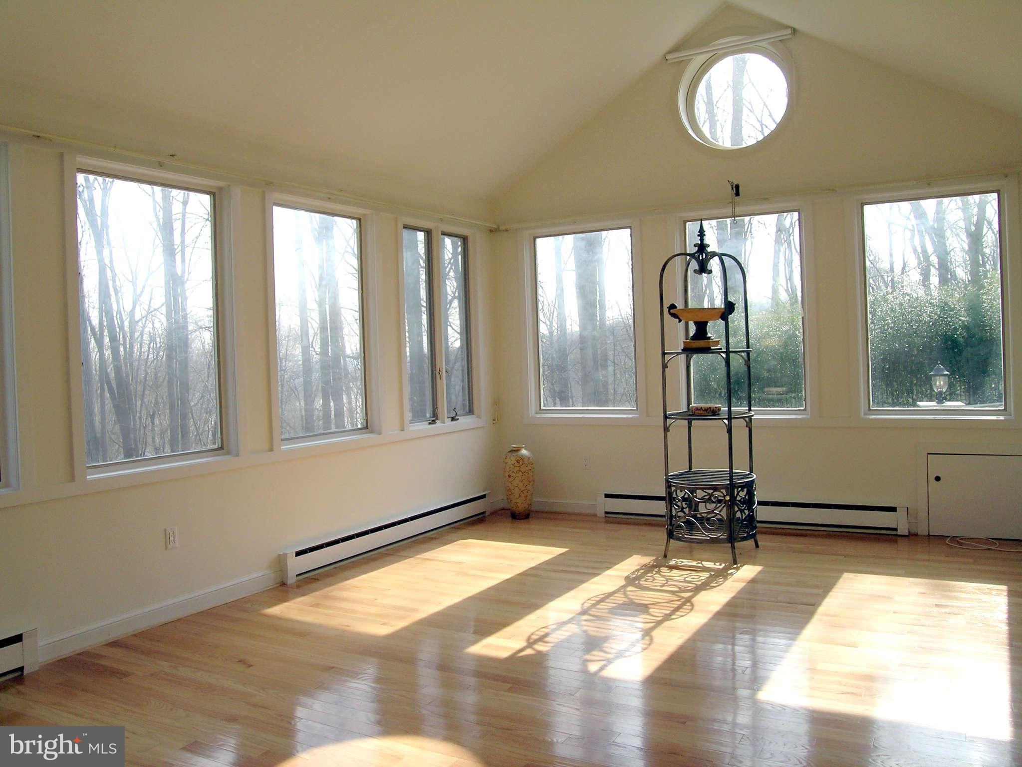 7570 Potomac Fall Road McLean, VA 22102 - Photo 4 of 20 a view of a room with windows
