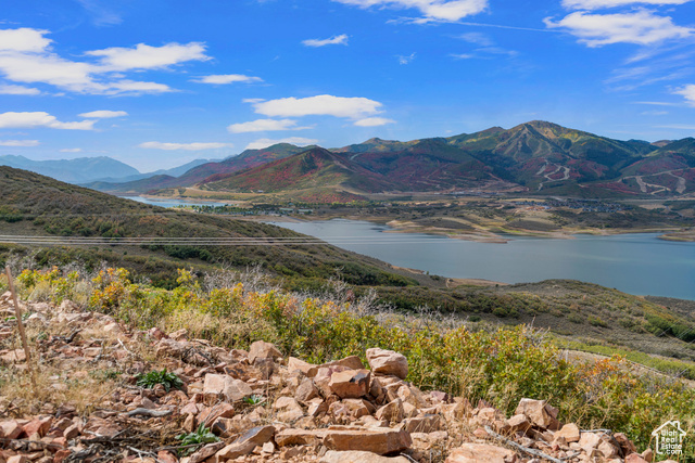10677 North Reflection Ridge, Unit 1 Hideout, UT 84036 - Photo 19 of 41 Mountain view with a nearby body of water