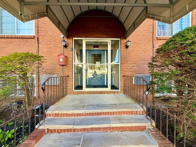 a view of a pathway with a house