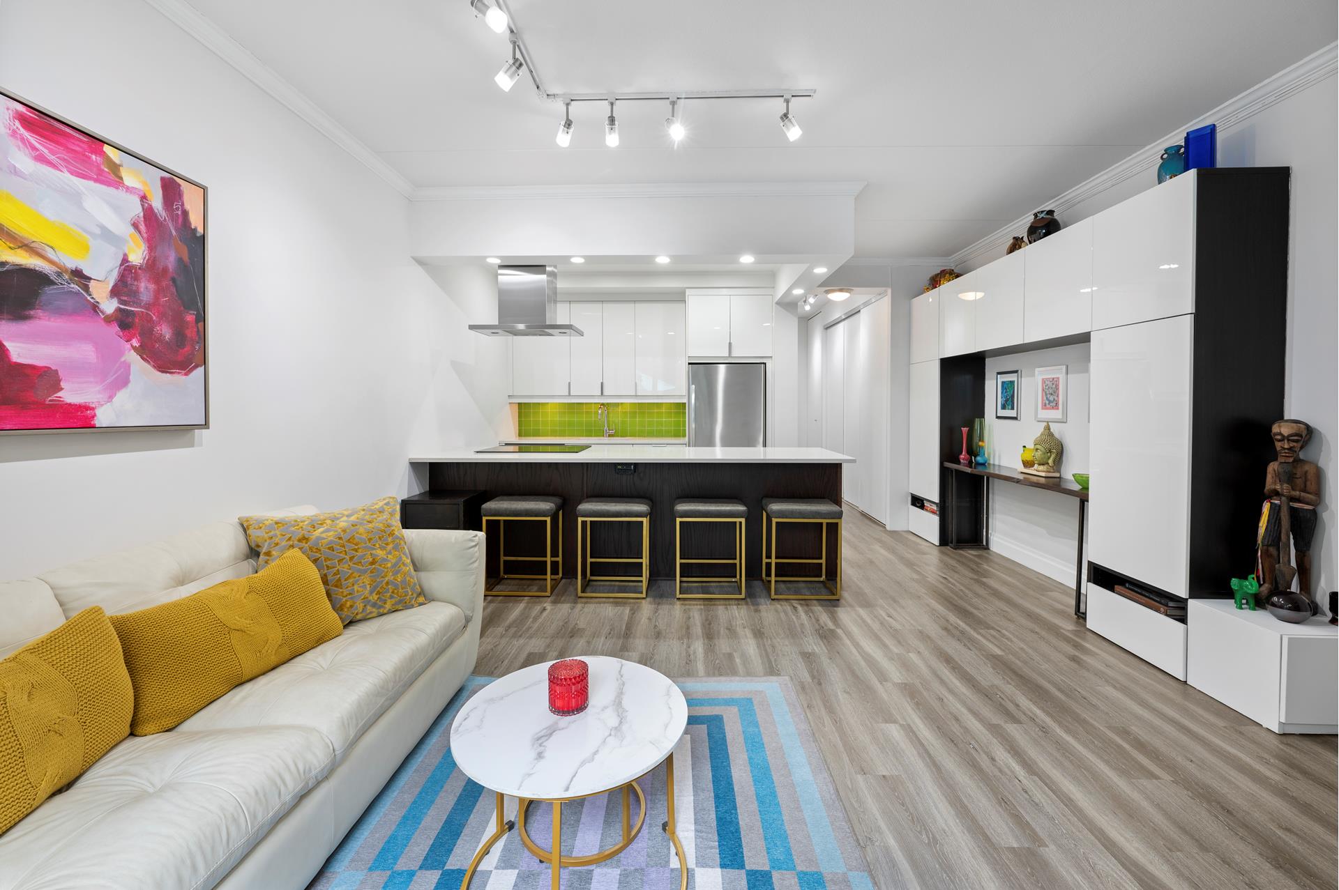 a room with furniture and a wooden floor