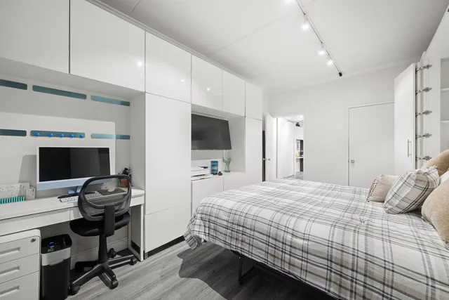 a picture of a bench in a big white house