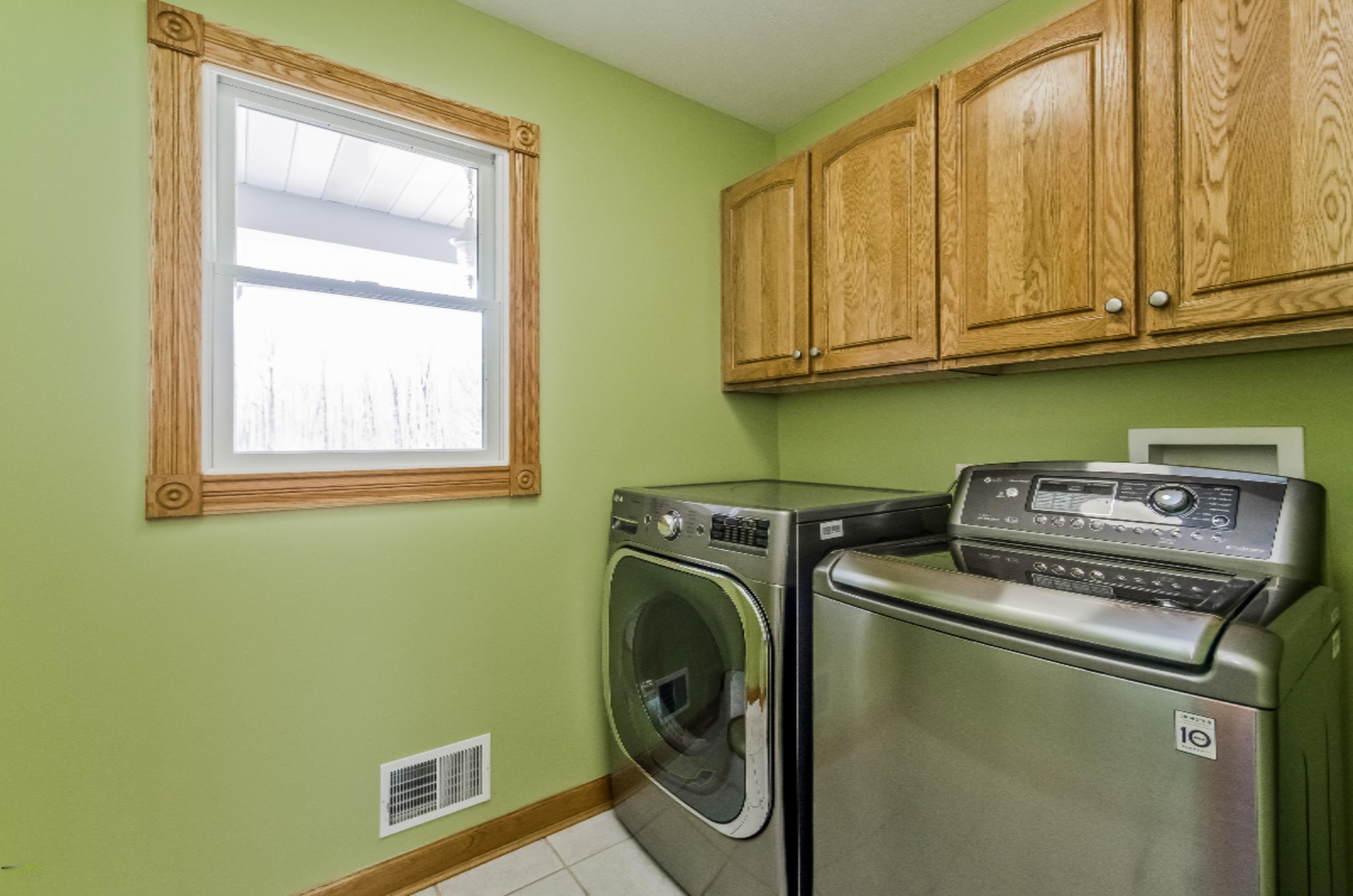 13180 Bailey Road Ravenna, MI 49451 - Photo 24 of 62 021-photo-laundry-room-933872