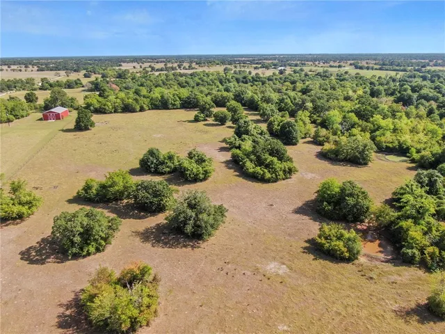 a view of a lake with a beach