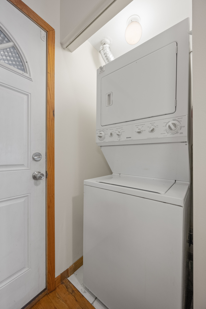 1167 East 61st Street, Unit 2 Chicago, IL 60637 - Photo 16 of 17 a utility room with dryer and washer