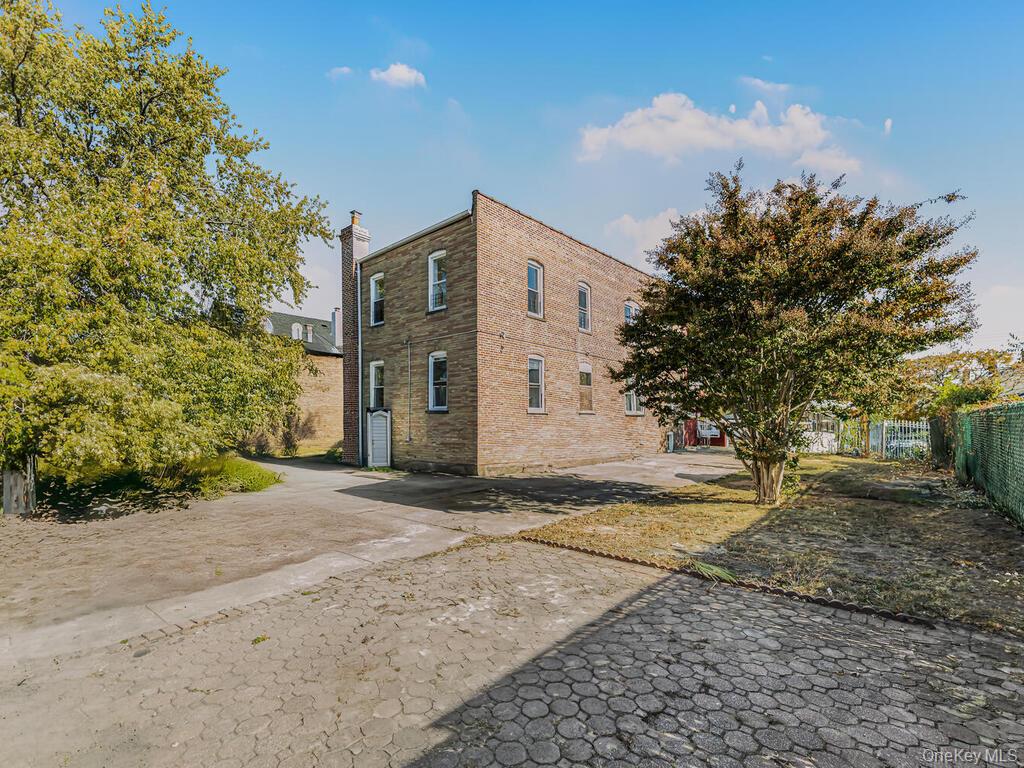 146-84 182nd Street Queens, NY 11413 - Photo 45 of 45 a view of a house with a yard