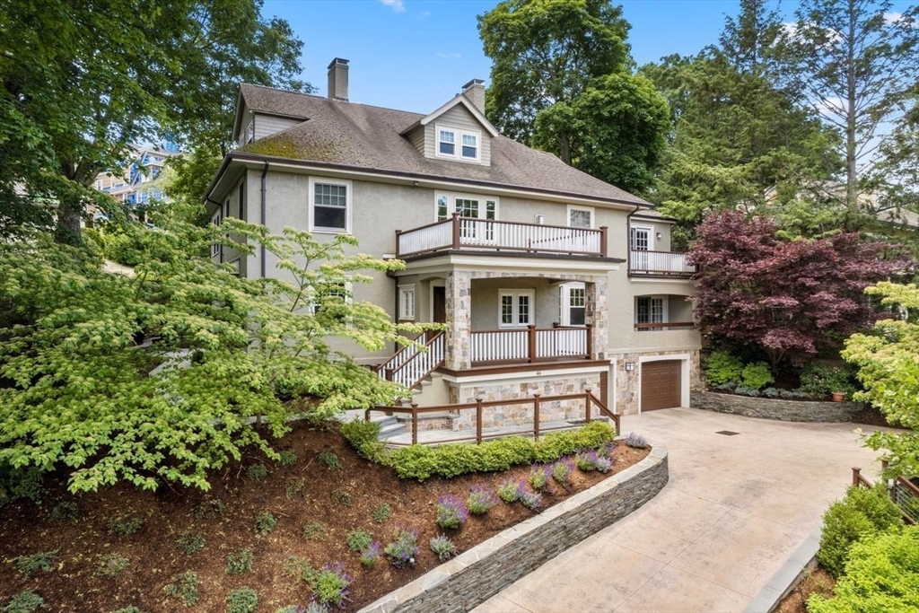 46 Hyslop Road Brookline, MA 02445 - Photo 1 of 33 front view of a house with a yard