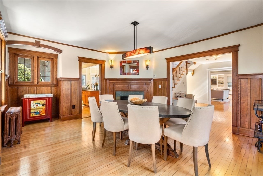 46 Hyslop Road Brookline, MA 02445 - Photo 11 of 33 a view of a dining room with furniture window and wooden floor