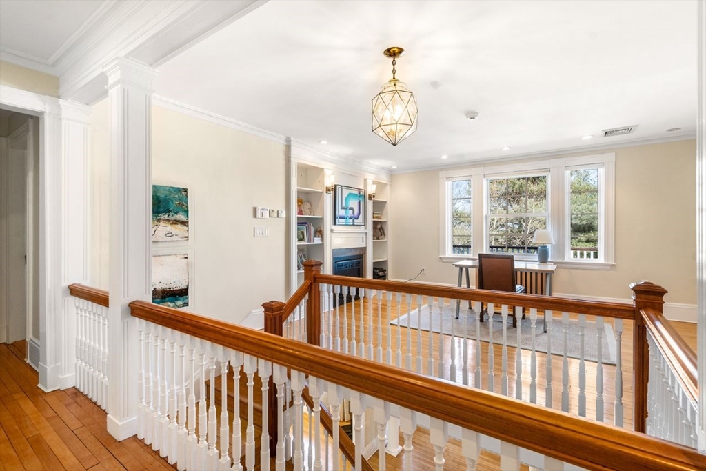 46 Hyslop Road Brookline, MA 02445 - Photo 16 of 33 a view of a living room and balcony with furniture