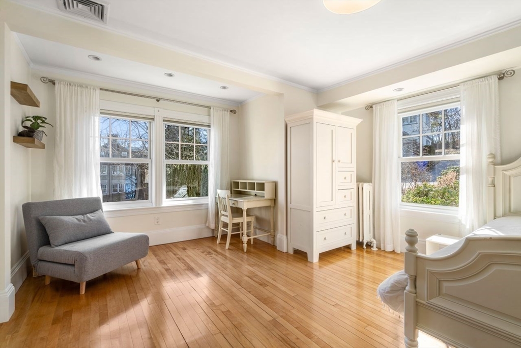 46 Hyslop Road Brookline, MA 02445 - Photo 21 of 33 a living room with furniture and a large window