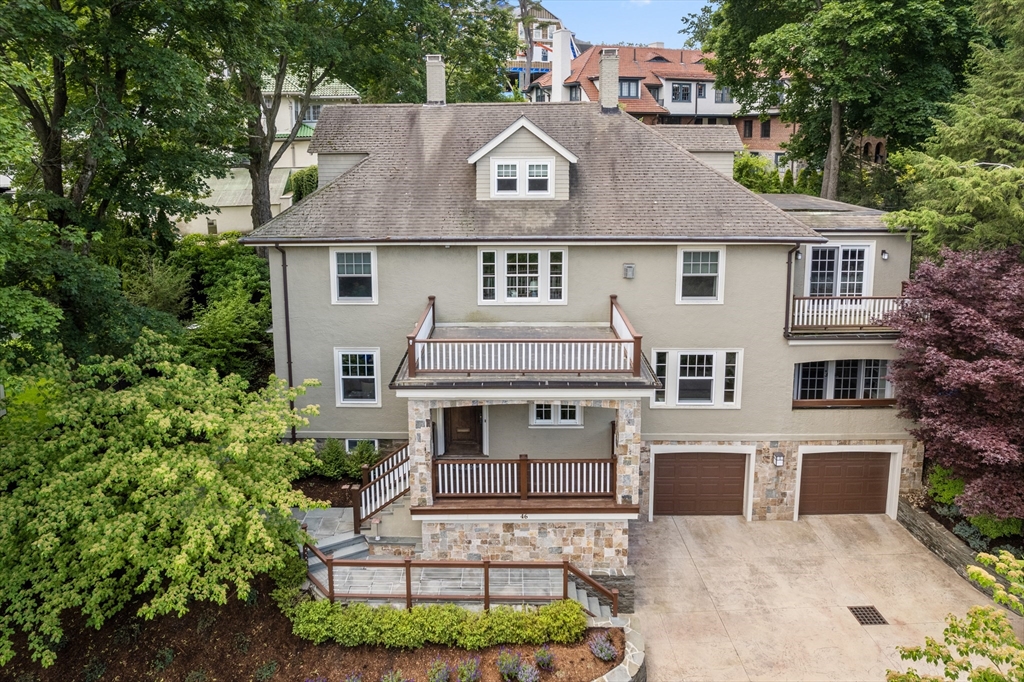 46 Hyslop Road Brookline, MA 02445 - Photo 33 of 33 a front view of a house with a garden