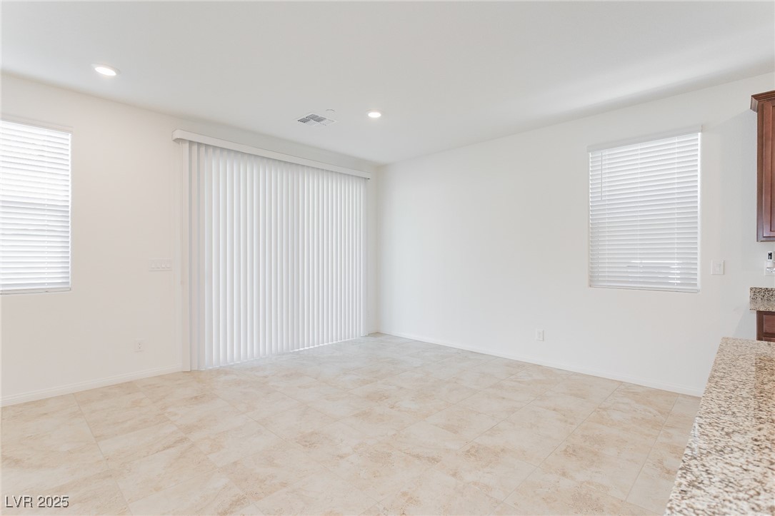3468 Bradano Lane Henderson, NV 89044 - Photo 11 of 50 Spare room featuring recessed lighting and baseboards