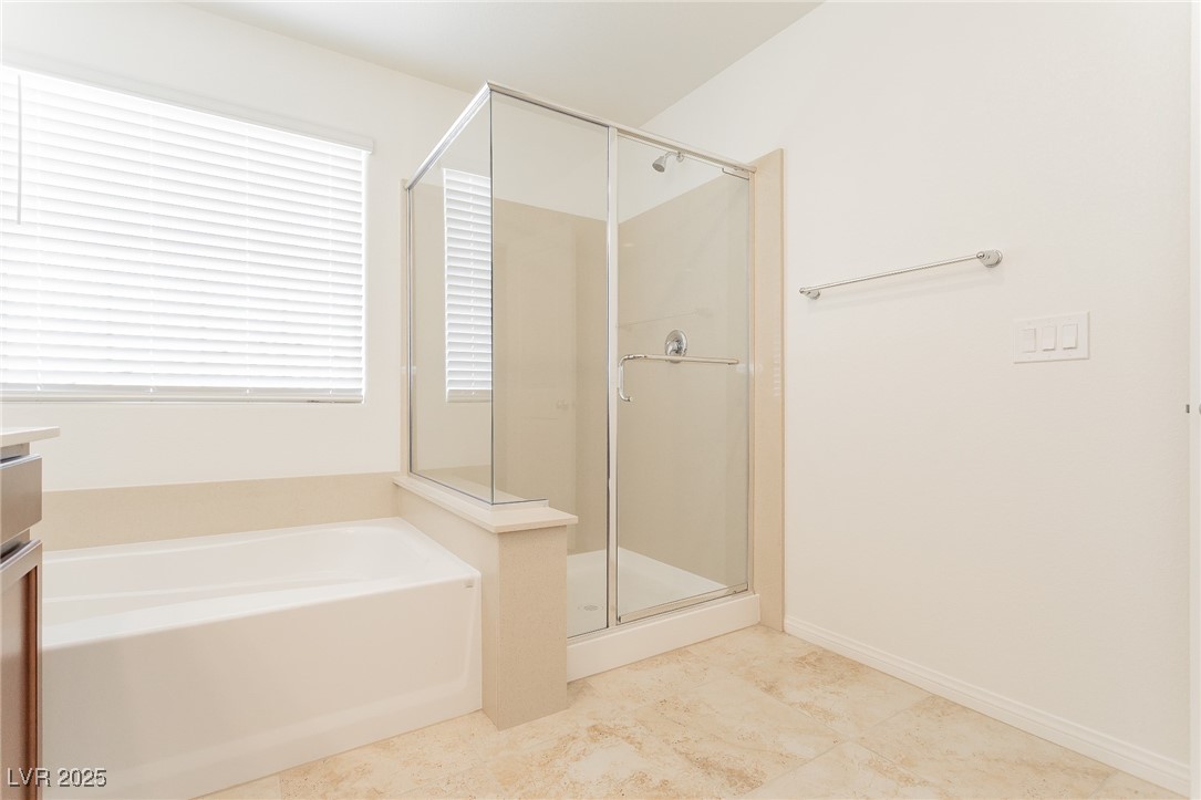 3468 Bradano Lane Henderson, NV 89044 - Photo 38 of 50 Bathroom with a garden tub, a shower stall, and vanity