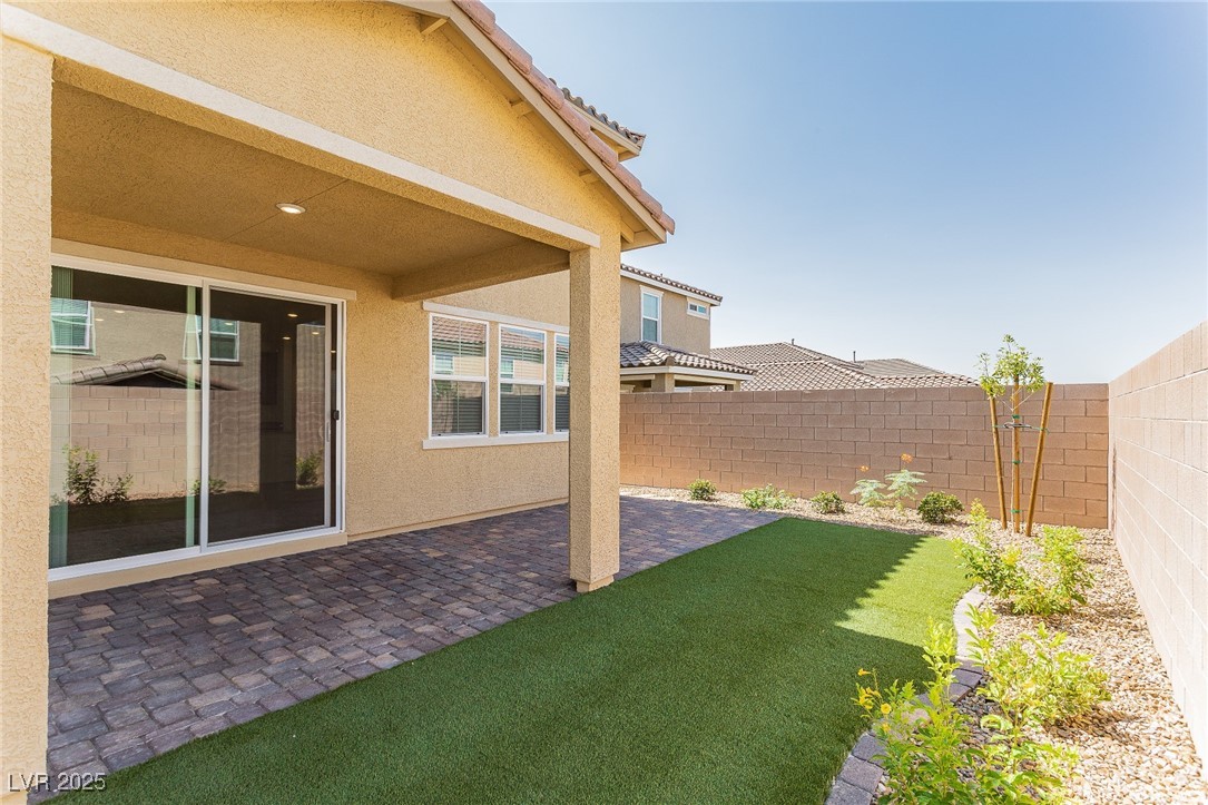 3468 Bradano Lane Henderson, NV 89044 - Photo 42 of 50 Fenced backyard with a patio