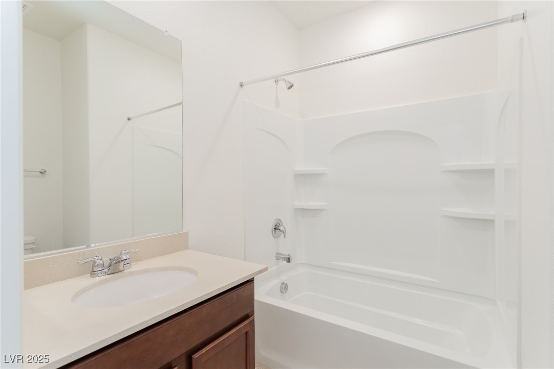 3468 Bradano Lane Henderson, NV 89044 - Photo 5 of 50 Bathroom featuring vanity and bathtub / shower combination