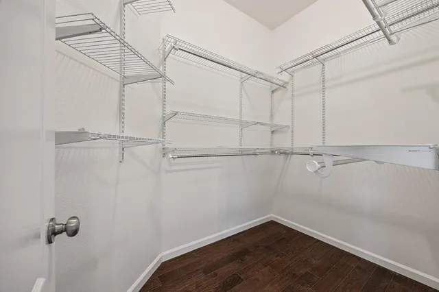 a view of a room with racks on the wall