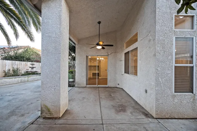 a view of a porch with a chandelier