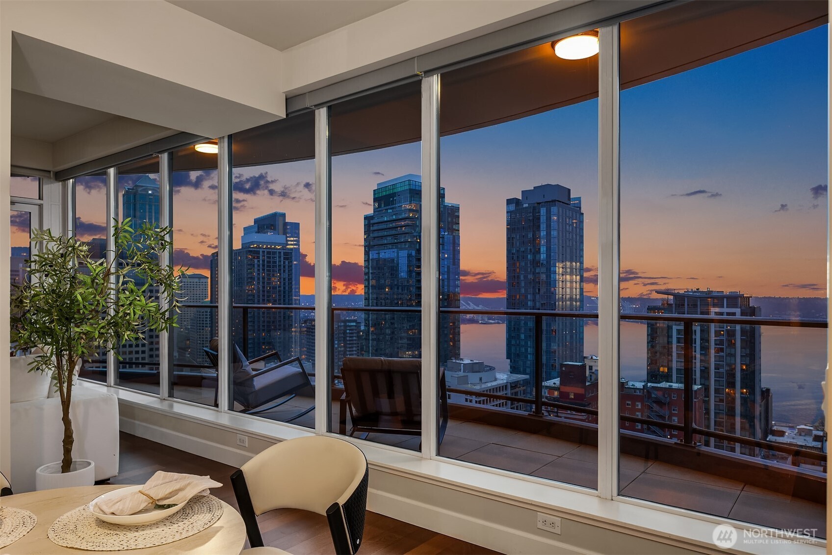 1920 4th Avenue, Unit 2702 Seattle, WA 98101 - Photo 1 of 40 a view of balcony with furniture