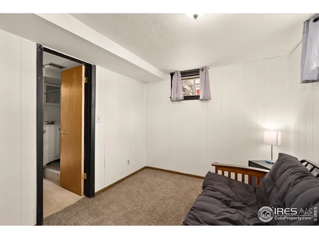 a view of a swimming pool with a lounge chairs