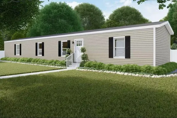 a front view of house with yard and green space