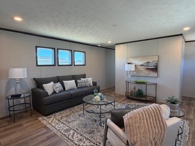 200 West 20th Street, Unit A138 Rifle, CO 81650 - Photo 3 of 7 a living room with furniture and a painting on the wall