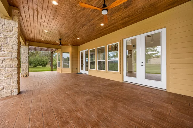 a view of a porch with a backyard