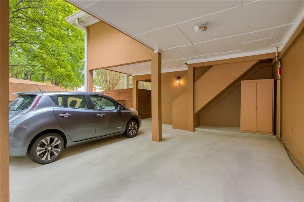 5264 Brooke Ridge Drive Dunwoody, GA 30338 - Photo 27 of 34 a car parked in front of a house