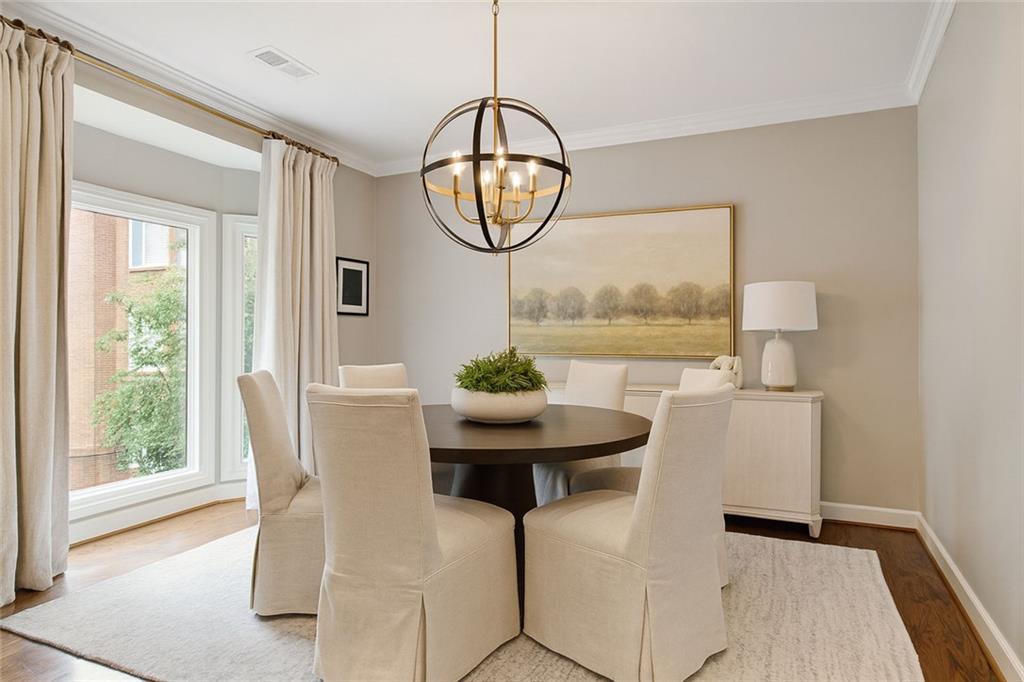 5264 Brooke Ridge Drive Dunwoody, GA 30338 - Photo 7 of 34 a view of a dining room with furniture and a window