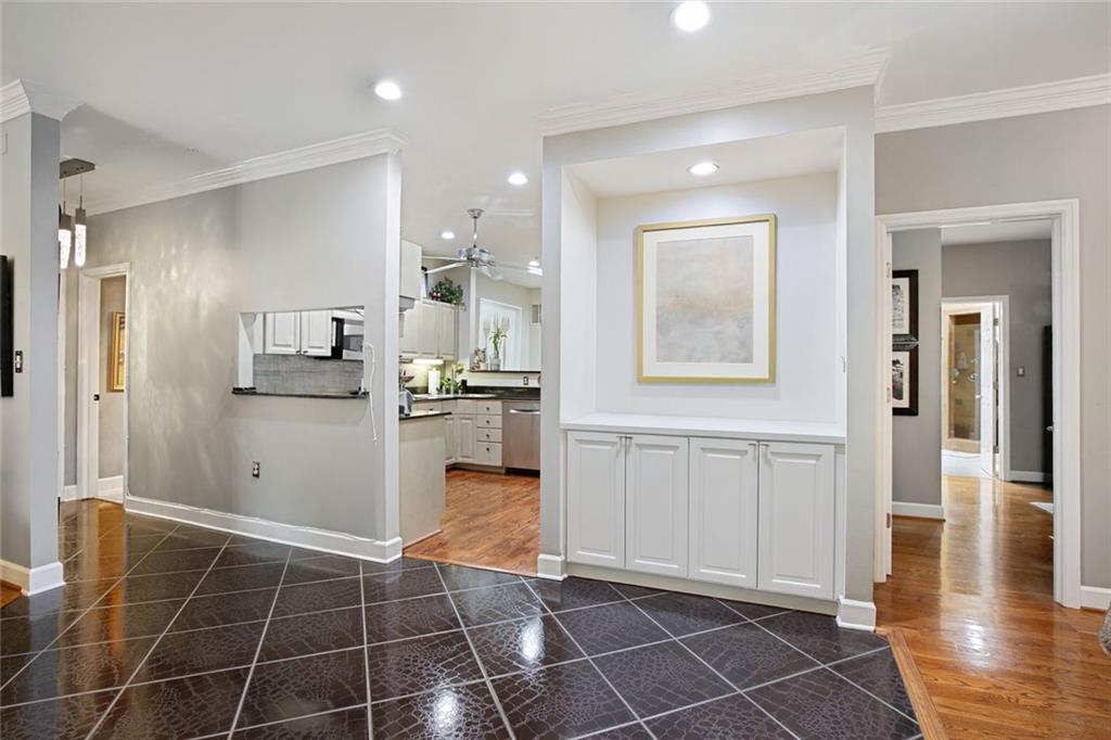 5264 Brooke Ridge Drive Dunwoody, GA 30338 - Photo 8 of 34 a open kitchen with stainless steel appliances kitchen island granite countertop a refrigerator and a sink