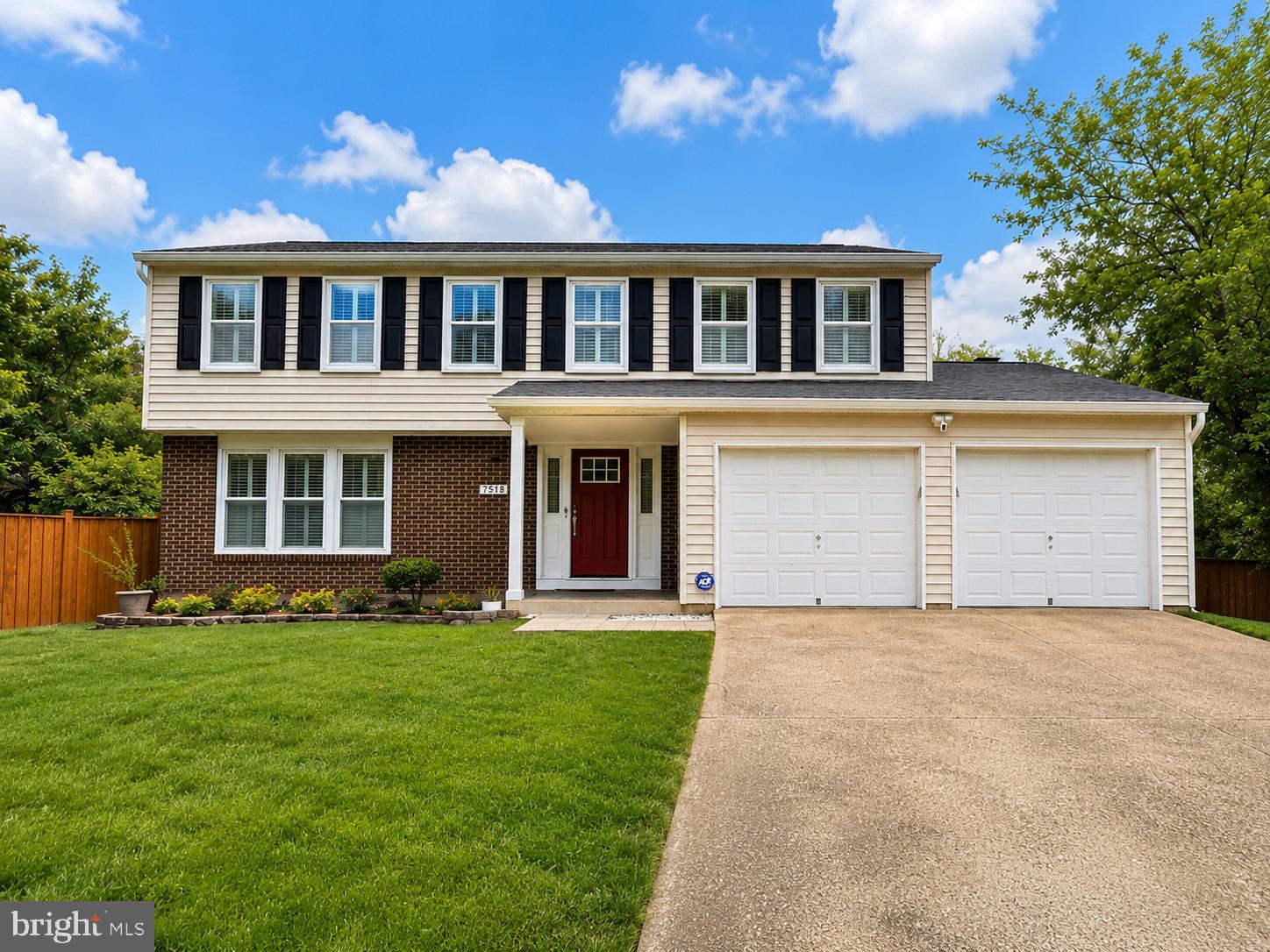 7518 Candytuft Court Springfield, VA 22153 - Photo 3 of 47 front view of a house with a yard