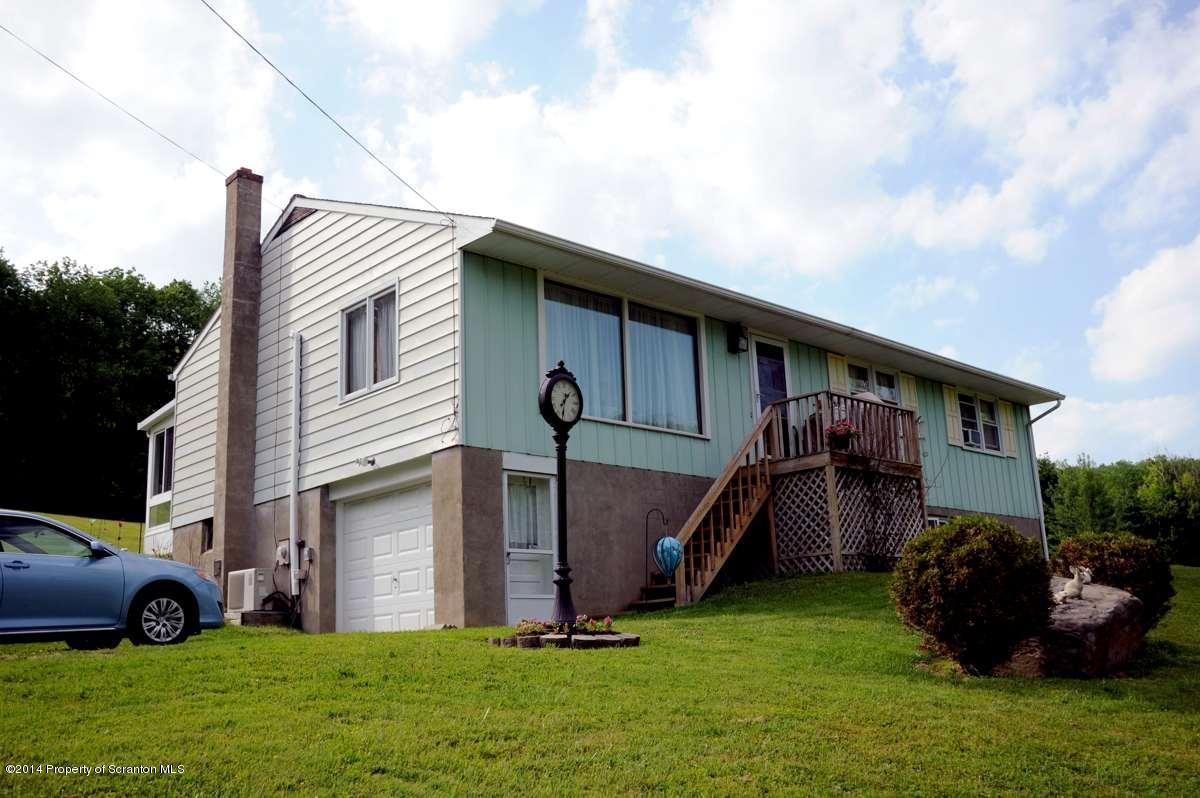 365 State Rte 2035 Nicholson, PA 18446 - Photo 1 of 28 a view of a house with a yard