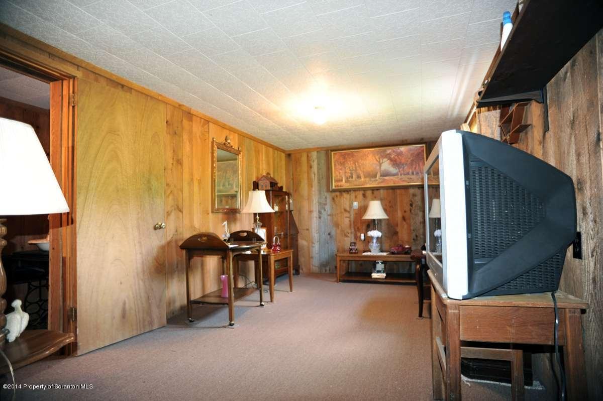 365 State Rte 2035 Nicholson, PA 18446 - Photo 15 of 28 a view of living room with furniture and a window