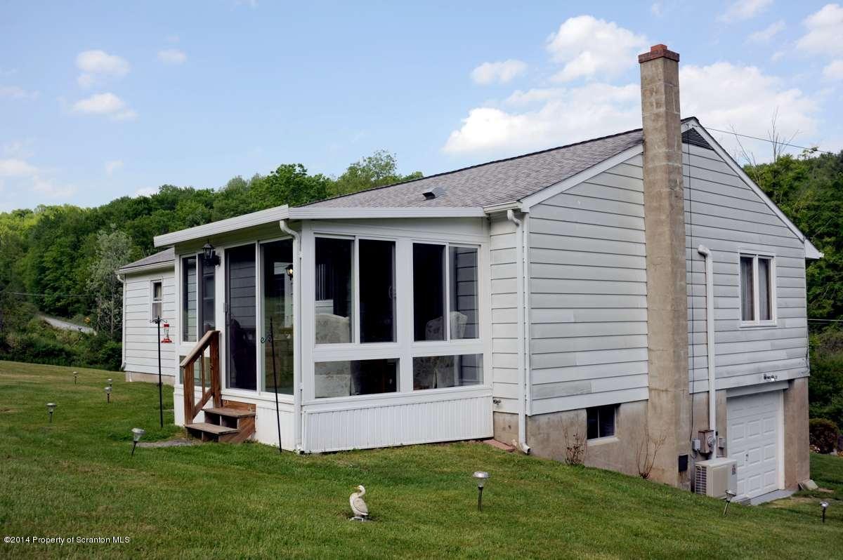 365 State Rte 2035 Nicholson, PA 18446 - Photo 17 of 28 a view of an house with backyard space and garden