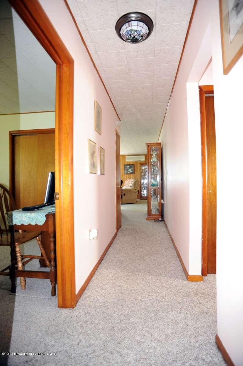 365 State Rte 2035 Nicholson, PA 18446 - Photo 26 of 28 a view of hallway with livingroom and furniture