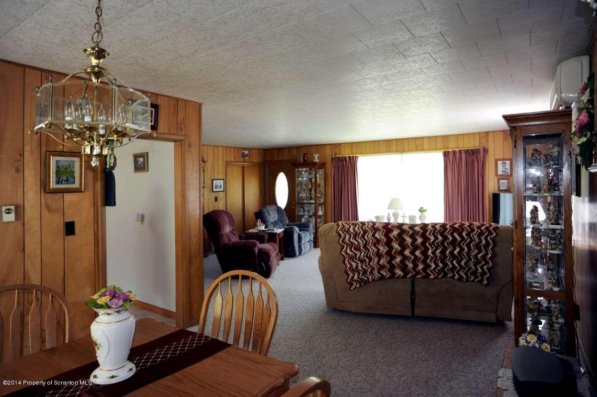 365 State Rte 2035 Nicholson, PA 18446 - Photo 7 of 28 a living room with furniture