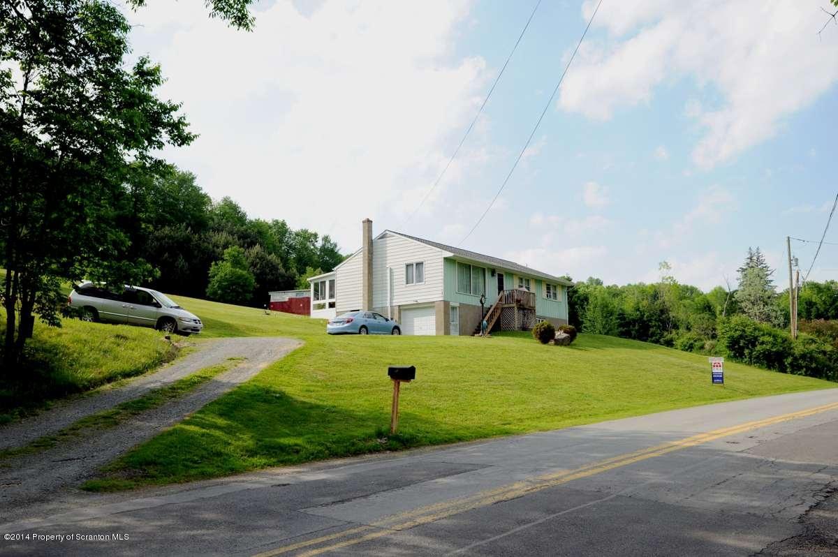 365 State Rte 2035 Nicholson, PA 18446 - Photo 9 of 28 a view of a house with a big yard plants and large trees