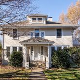 a front view of a house with a porch