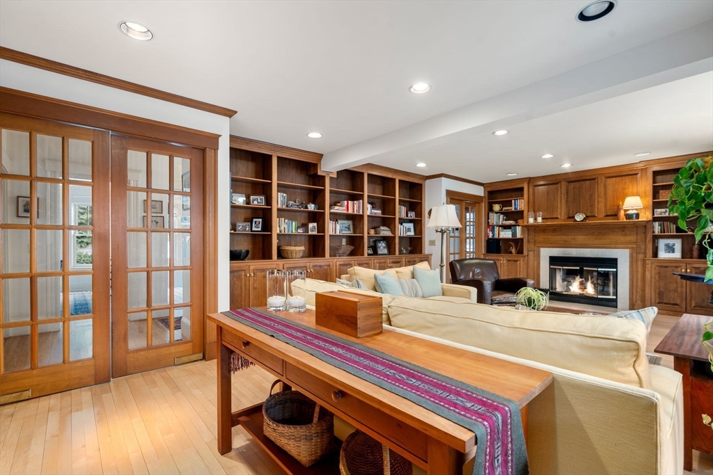 347 Manning Street Needham, MA 02492 - Photo 15 of 42 a living room with furniture and a fireplace