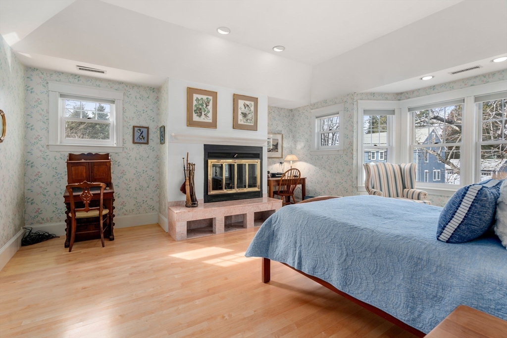 347 Manning Street Needham, MA 02492 - Photo 23 of 42 a bedroom with a bed and a couch