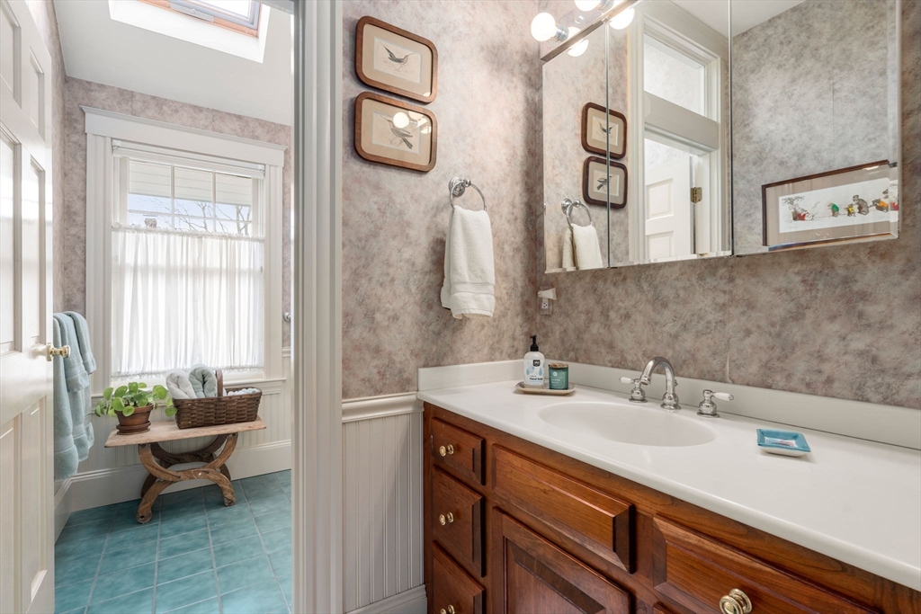 347 Manning Street Needham, MA 02492 - Photo 30 of 42 a bathroom with a sink and a mirror